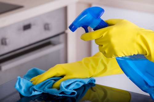 Deep cleaning a sofa with upholstery equipment