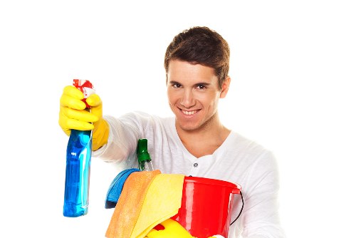 Technician checking safety conditions during a carpet cleaning visit