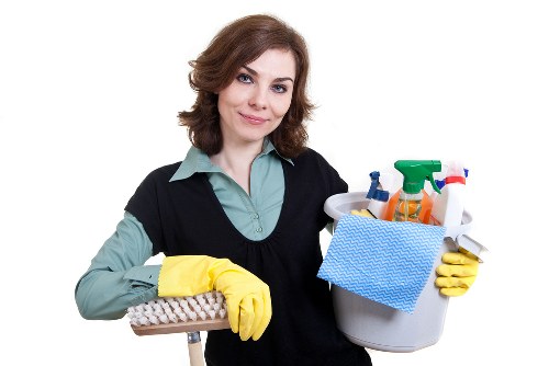 Insured carpet cleaning team working carefully in Parsons Green